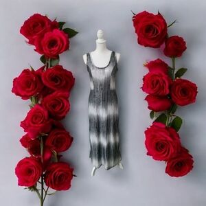 ETHYL LONG DRESS SIZE MED. BLK. WHITE & LIGHT BLUE FABRIC HAS ALOT OF SHINE